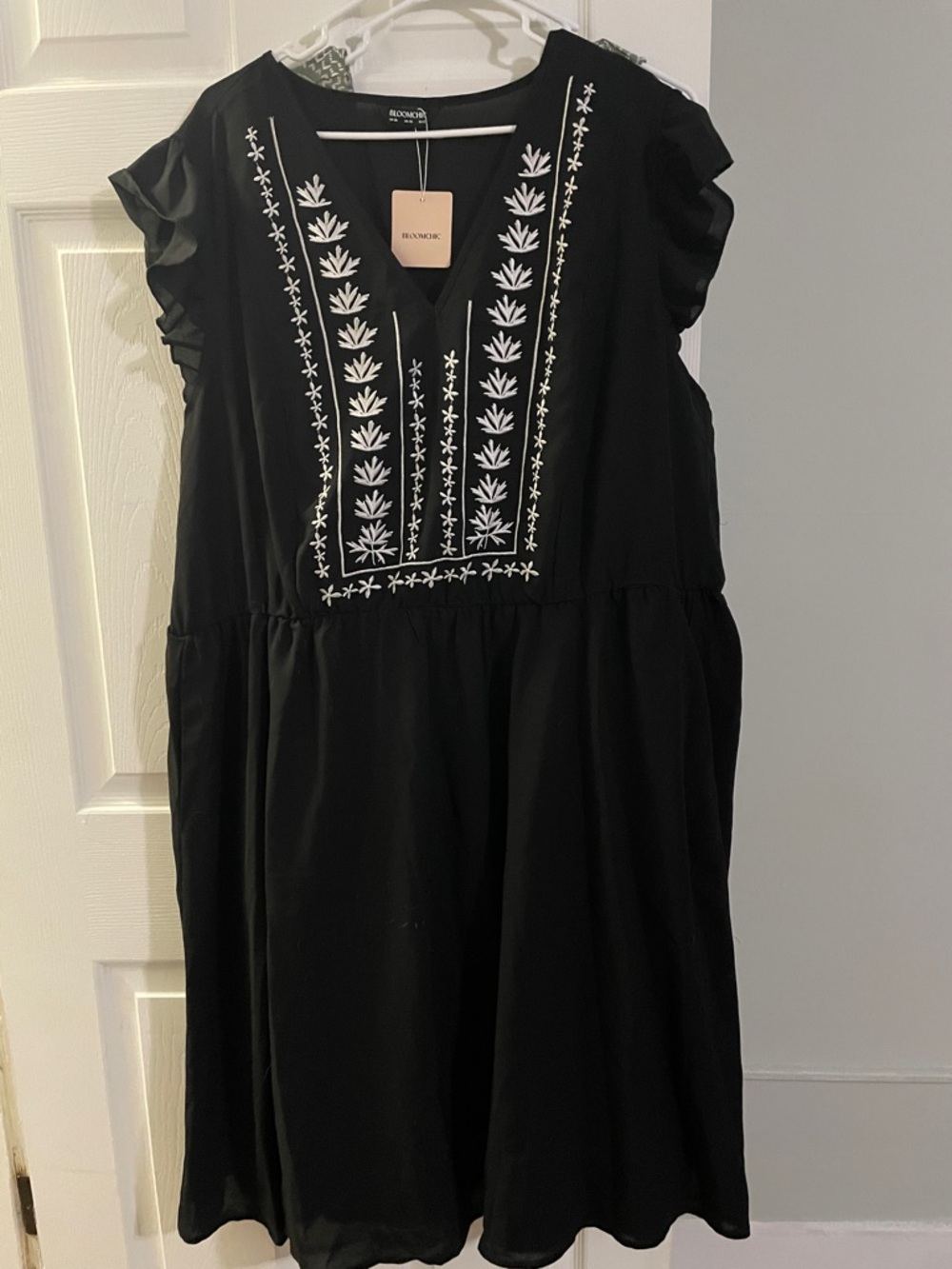 BloomChic Black Dress with White Embroidered Bib